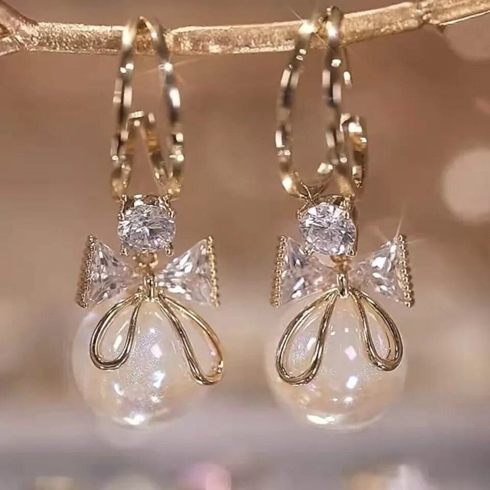 Krystal Bow & Pearl Earrings () - Earrings by MunekaWear