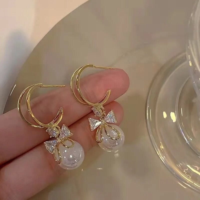 Krystal Bow & Pearl Earrings () - Earrings by MunekaWear